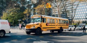 A boy stops a bus